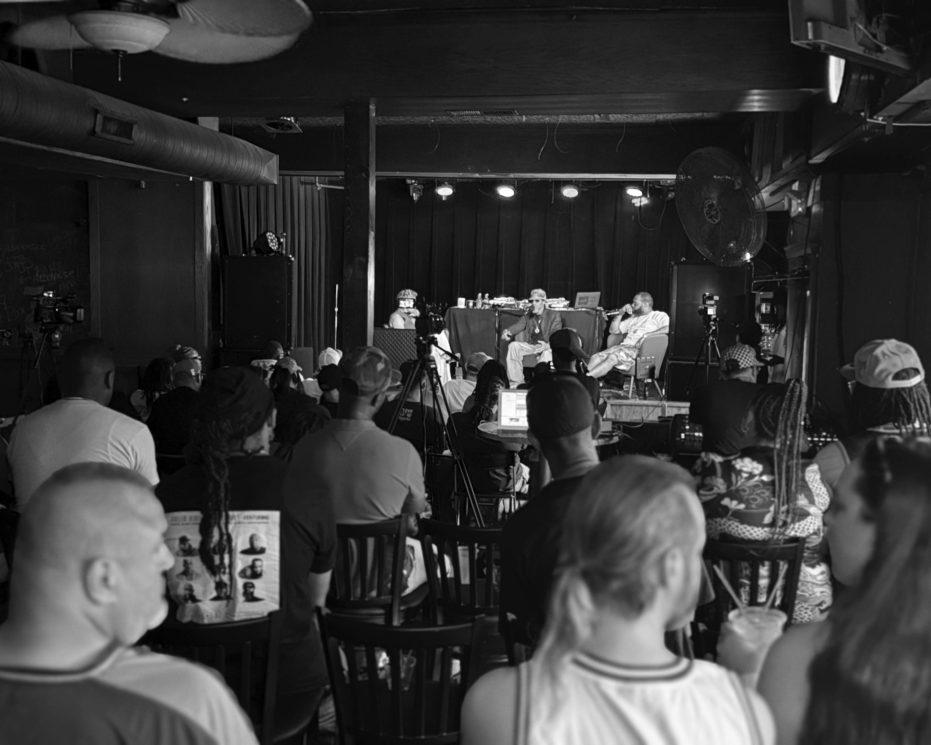 Audience watching a live Queens Address interview